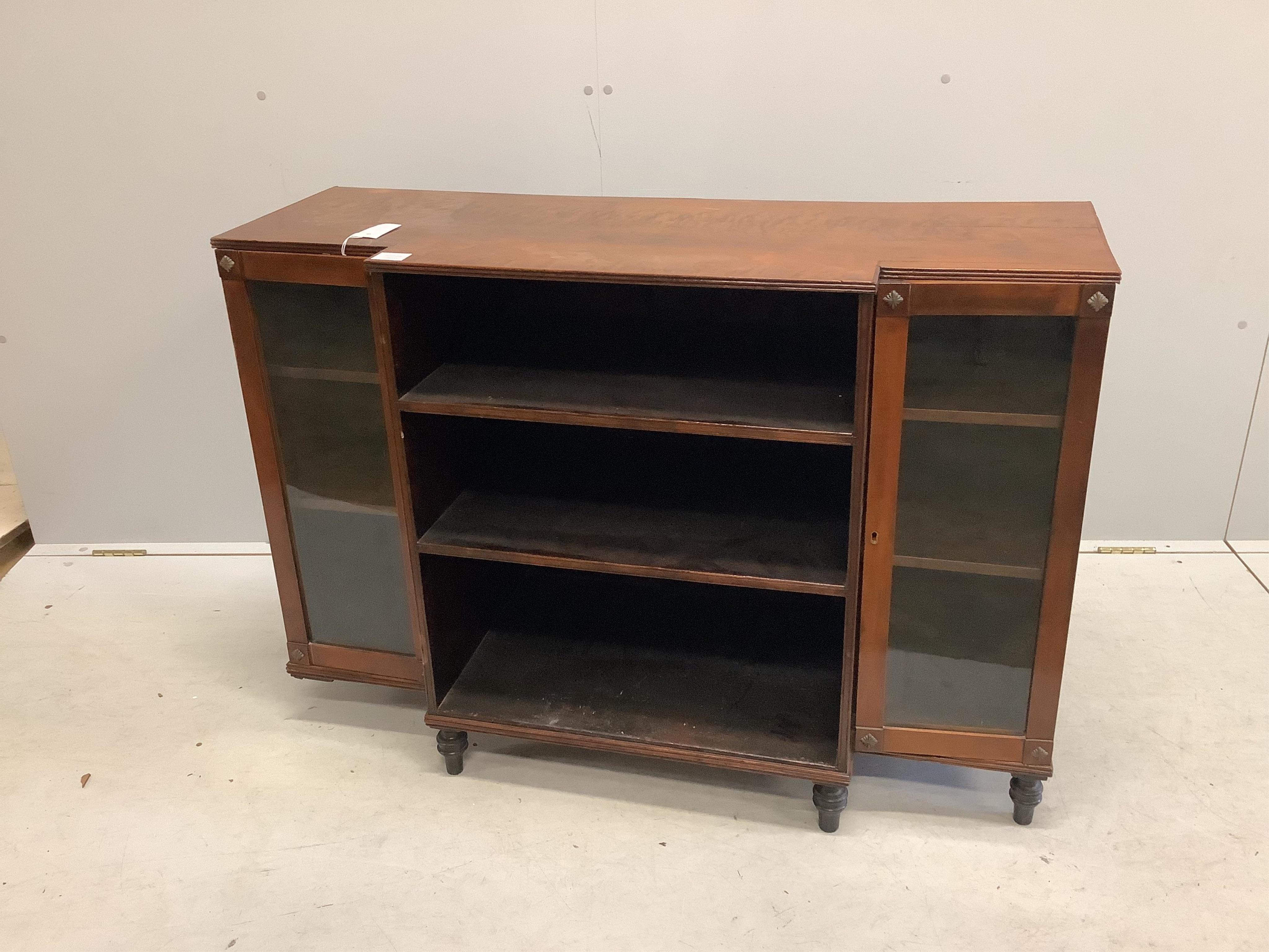 A Regency style mahogany breakfront dwarf bookcase, width 112cm, depth 42cm, height 79cm. Condition - poor